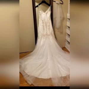 Mermaid white wedding gown size 6 length 5'2" with veil.